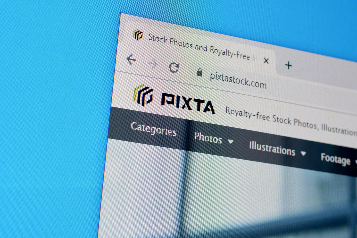 Homepage of pixta website on the display of PC, url - pixtastock.com. photo