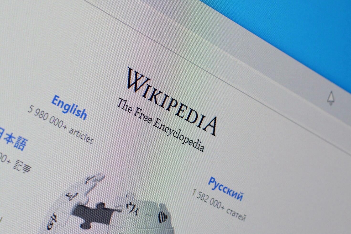 Homepage of wikipedia website on the display of PC, url - wikipedia.org. photo