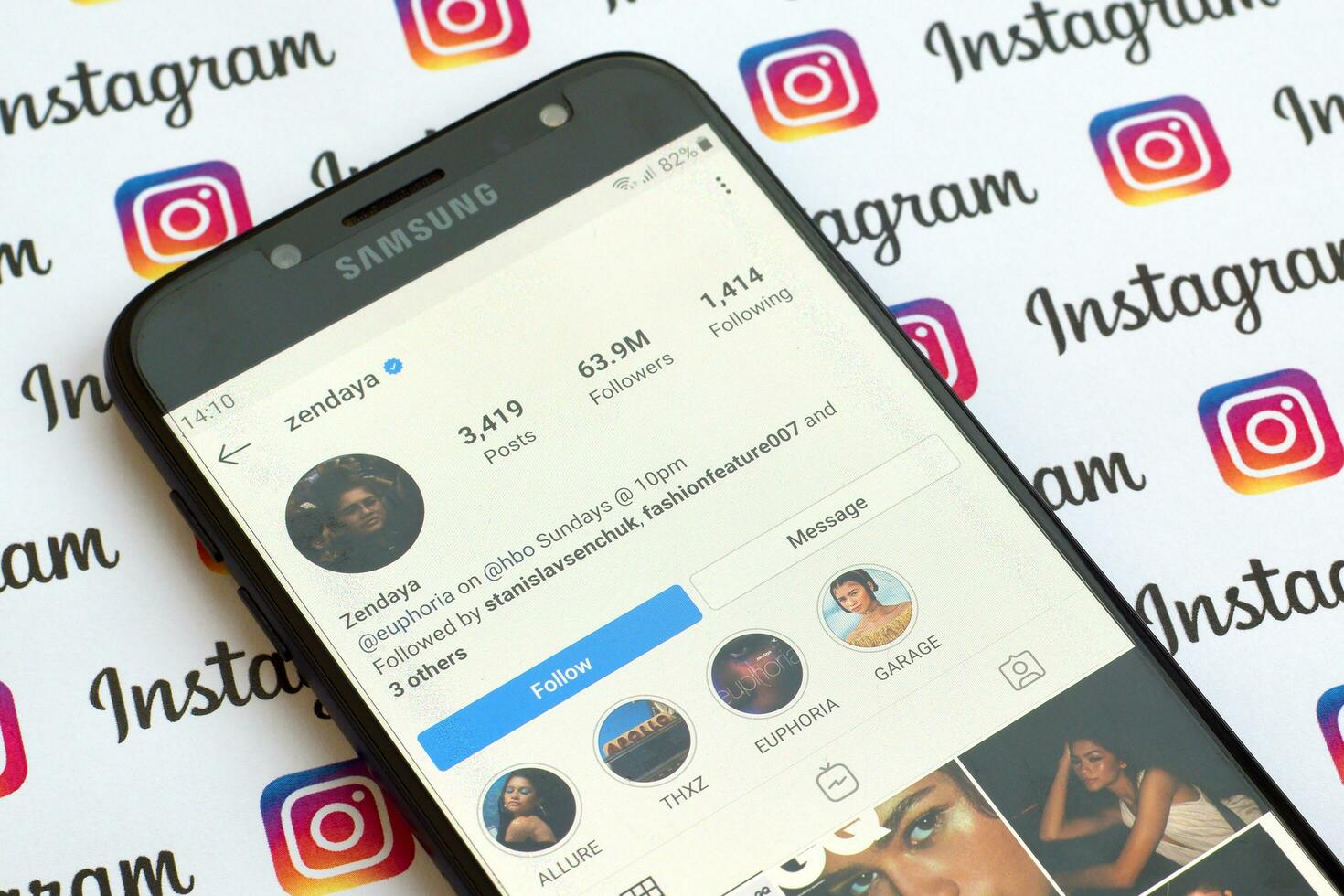 Zendaya official instagram account on smartphone screen on paper instagram banner. photo