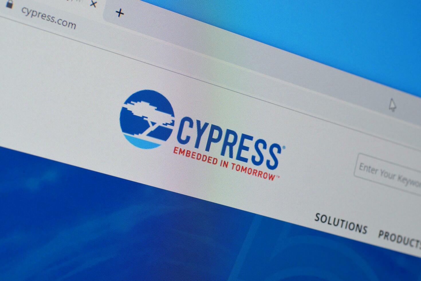 Homepage of cypress website on the display of PC, url - cypress.com. photo