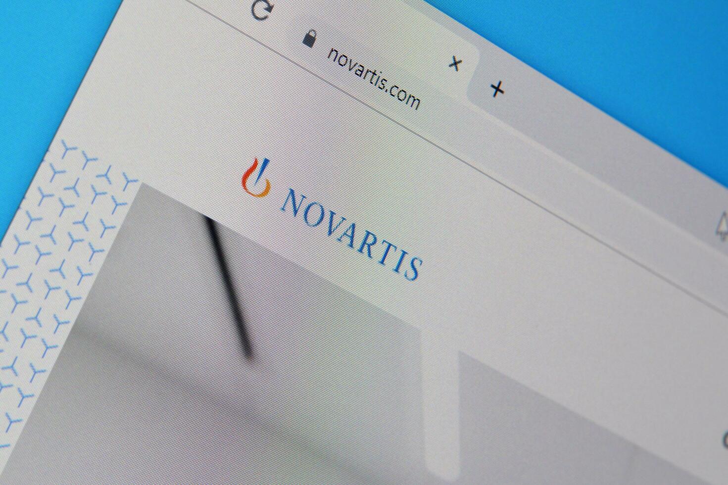 Homepage of novartis website on the display of PC, url - novartis.com. photo