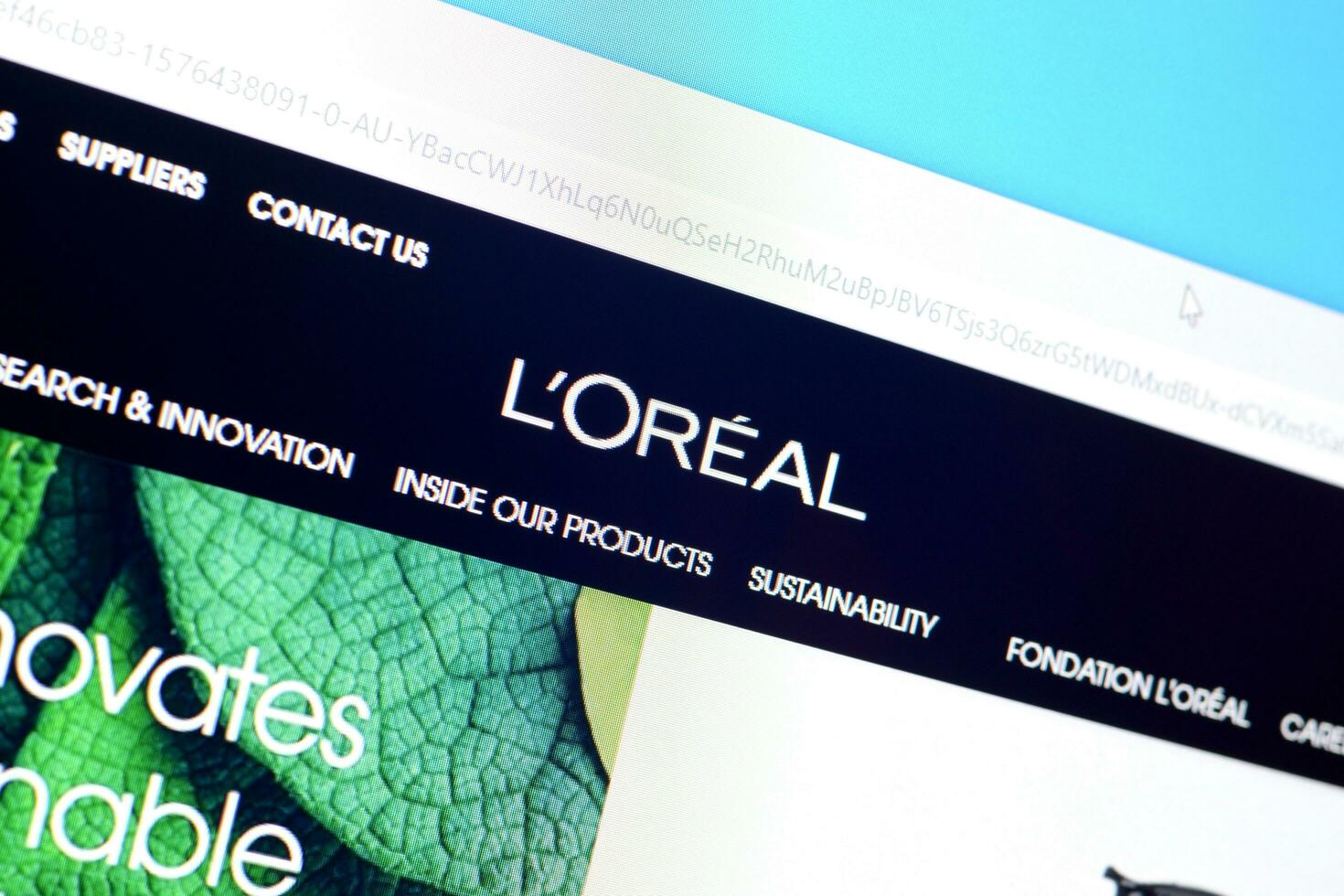 Homepage of loreal paris website on the display of PC, url - loreal.com. photo