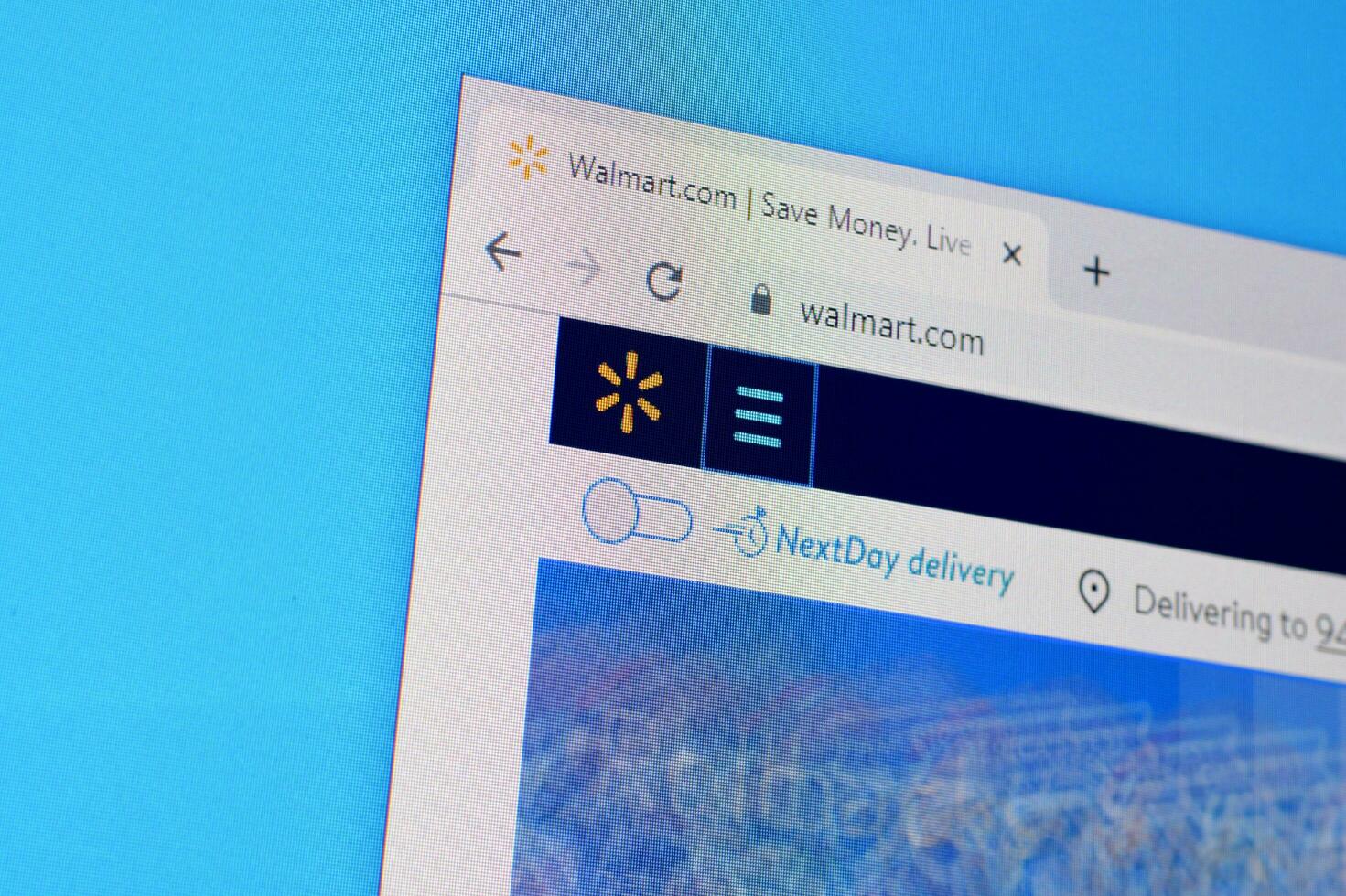 Homepage of walmart website on the display of PC, url - walmart.com. photo