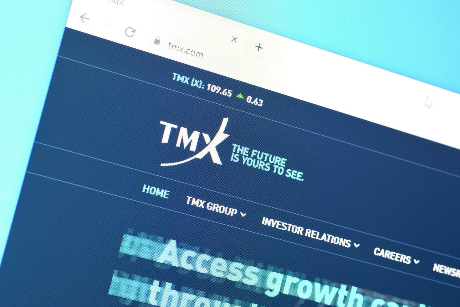 Homepage of tmx website on the display of PC, url - tmx.com. photo