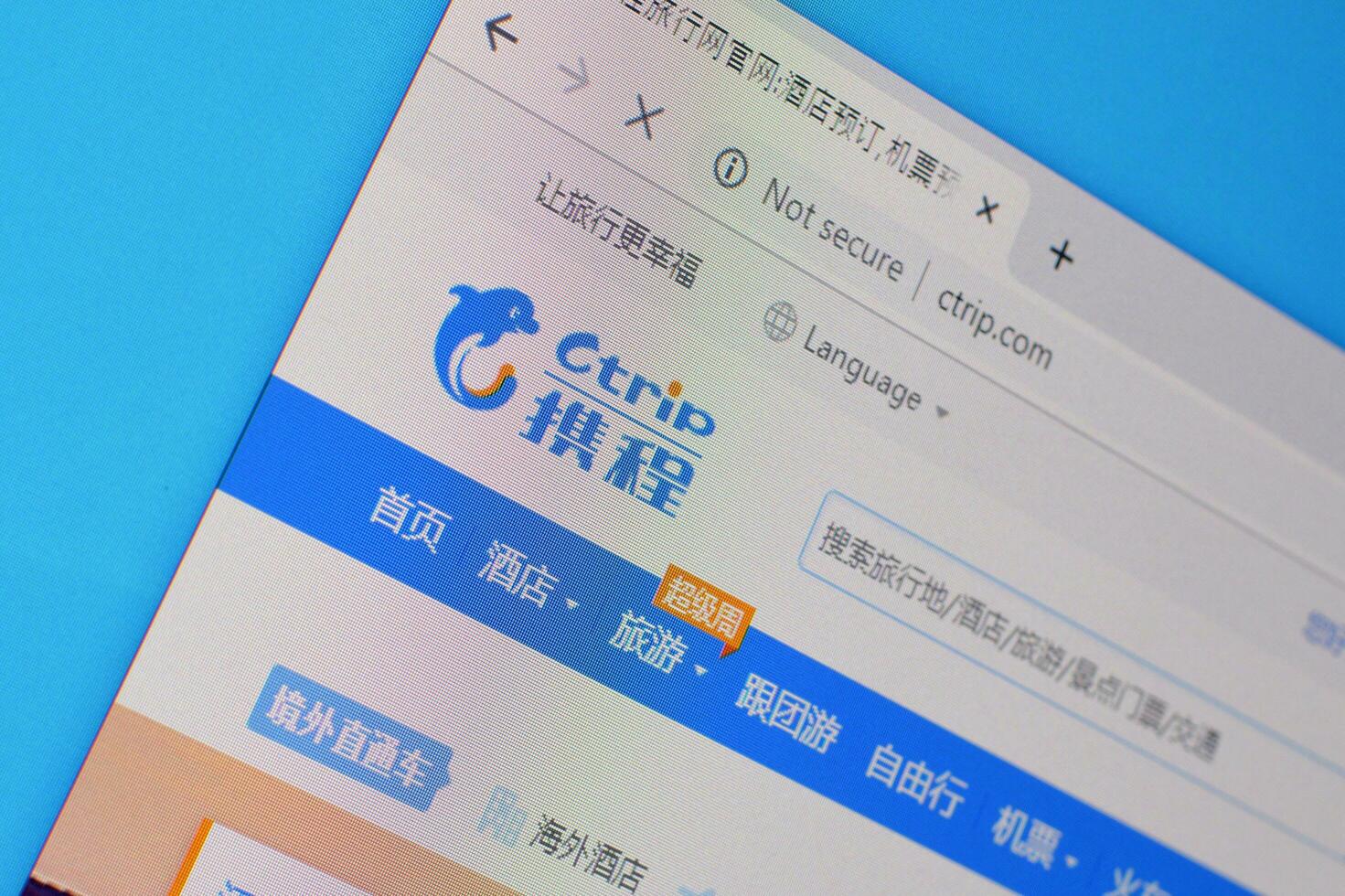 Homepage of ctrip website on the display of PC, url - ctrip.com. photo