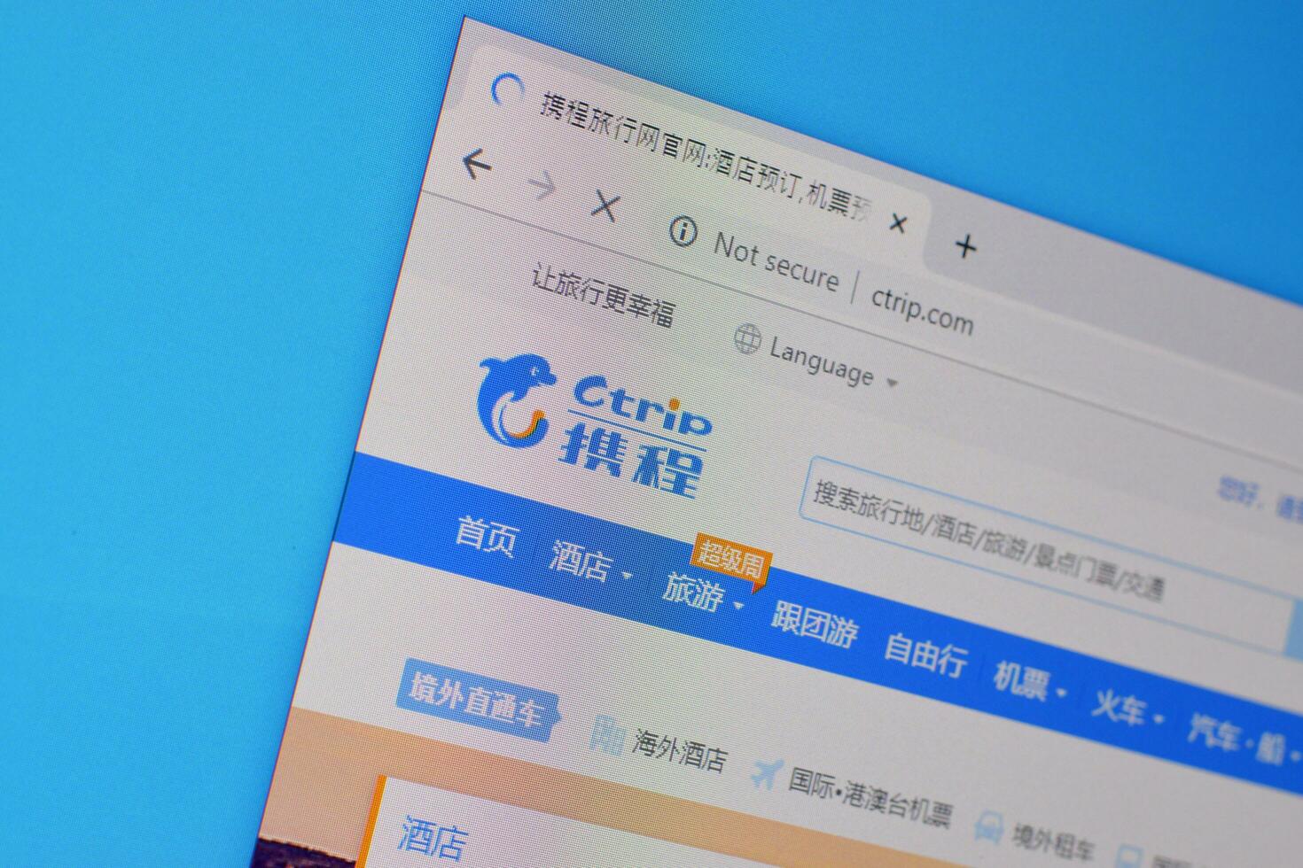 Homepage of ctrip website on the display of PC, url - ctrip.com. photo