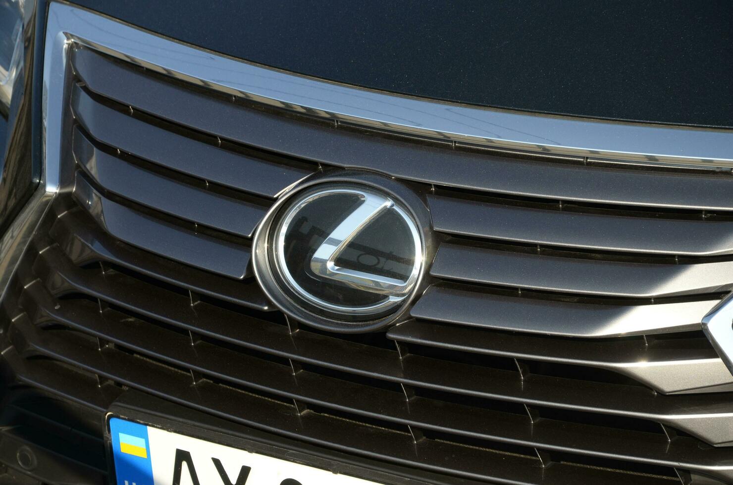 KHARKOV, UKRAINE - OCTOBER 20, 2019 Late model Lexus crossover utility vehicle parked on the boulevard. Front view. Lexus is the luxury vehicle division of Japanese automaker Toyota photo