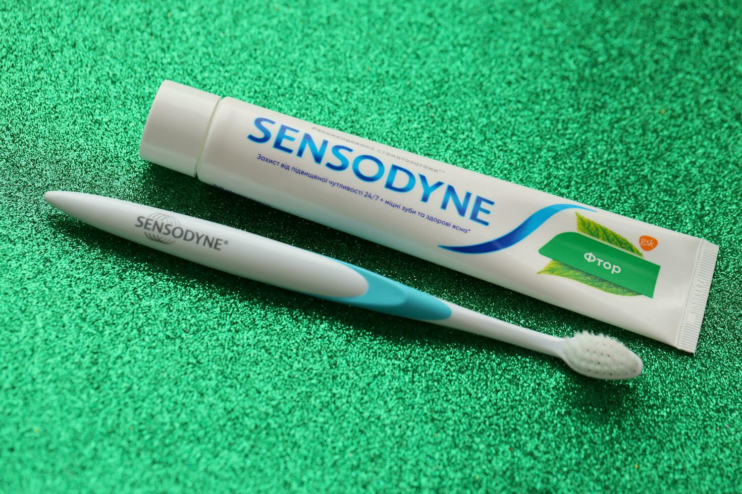 KYIV, UKRAINE - MAY 4, 2022 Sensodyne fluorine or fluor is a daily fluoride toothpaste photo