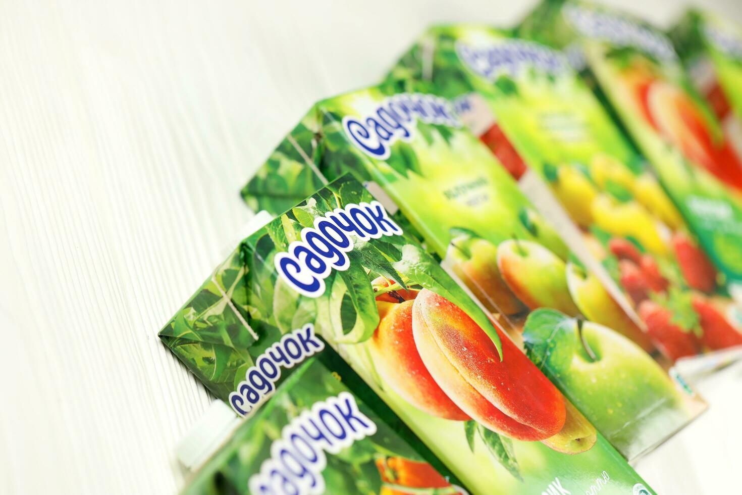 KHARKIV, UKRAINE - JANUARY 2, 2021 Sadochok various taste nectar from peach, apple and strawberry with orange flavour juice photo