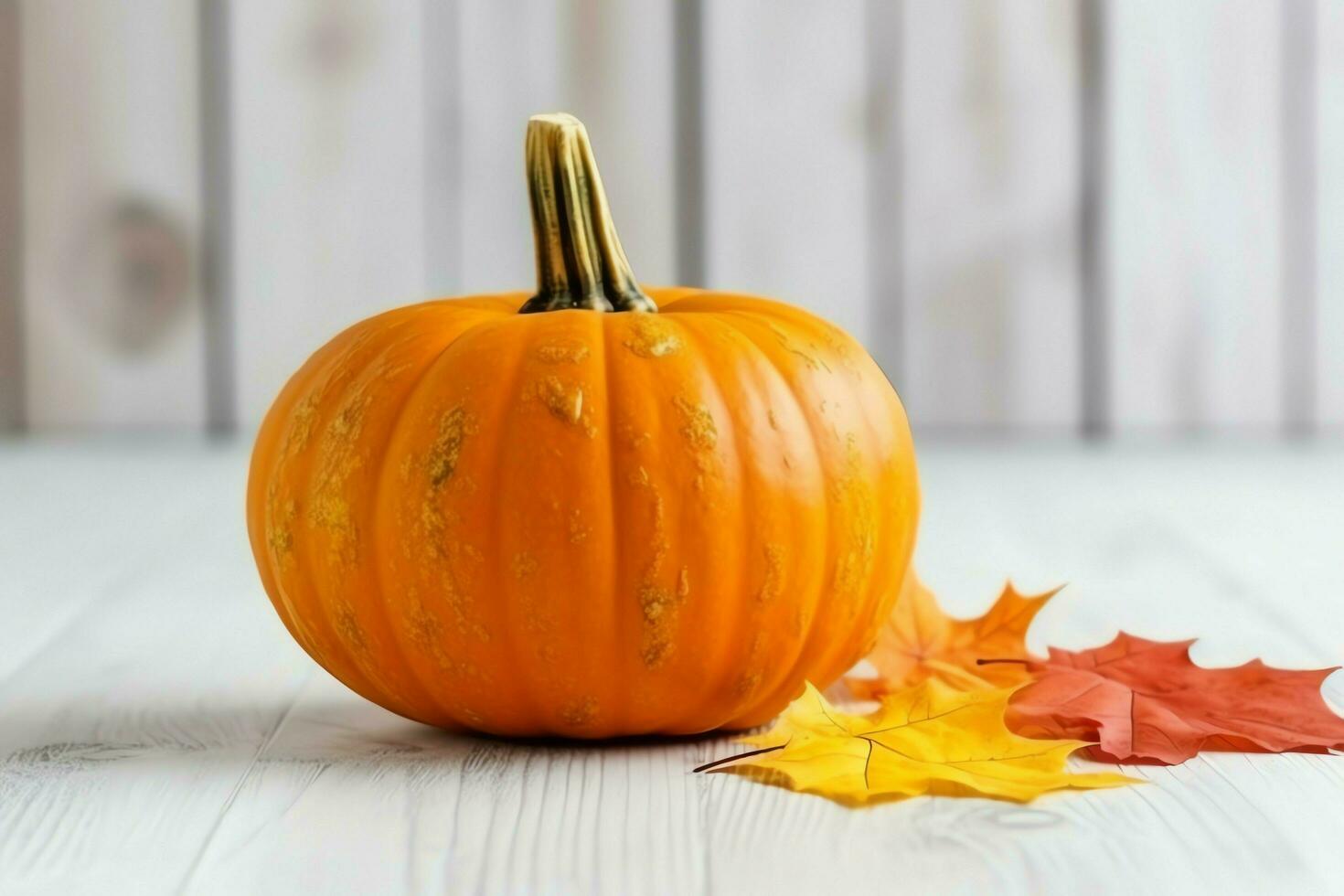 Decorative pumpkin background and dry autumn leaves on wooden arrangement indoors. Halloween concept by AI generated photo