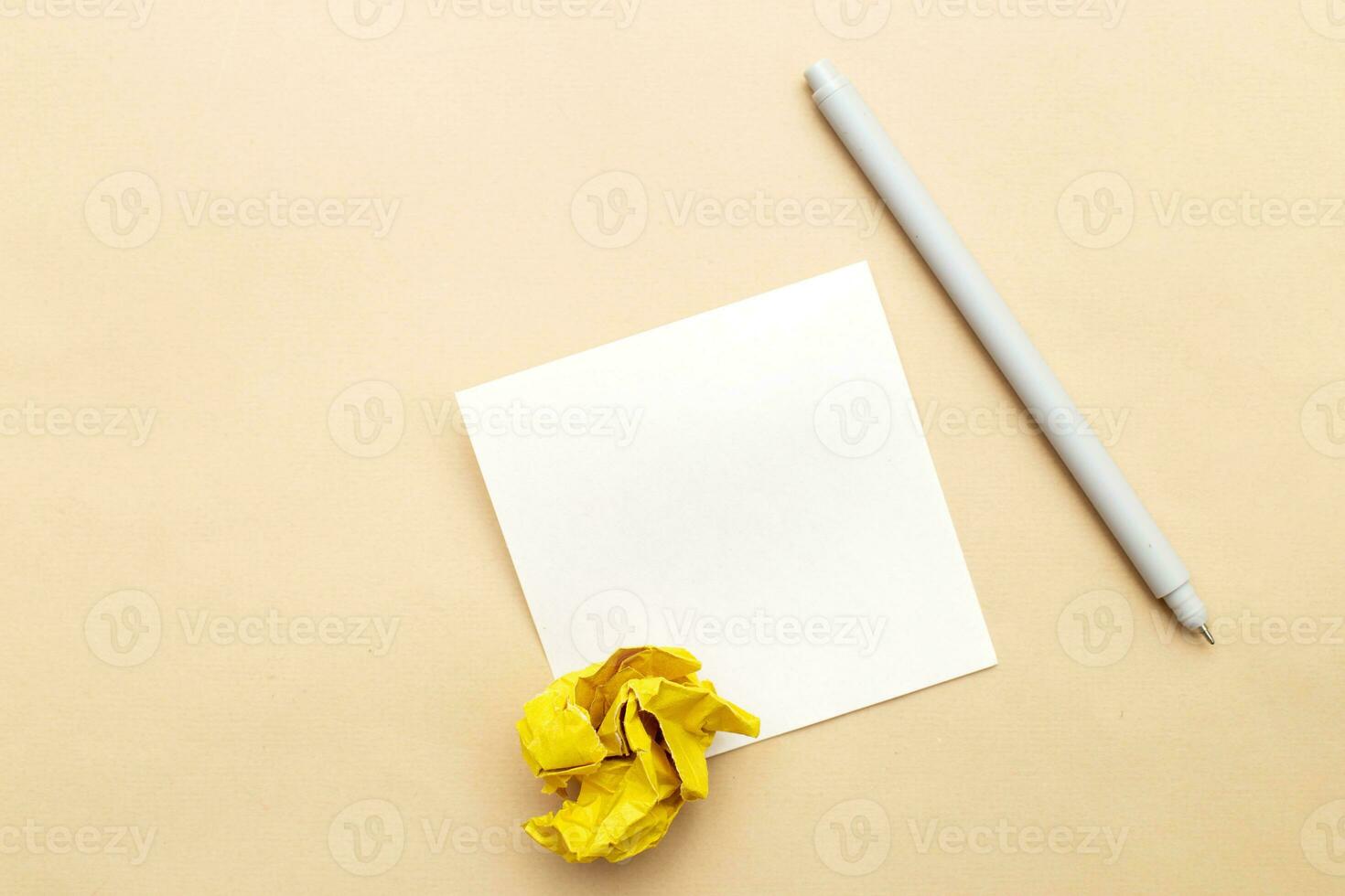 crumpled yelllow paper as concept creative idea and innovation. writing ideas, to do list concept. photo