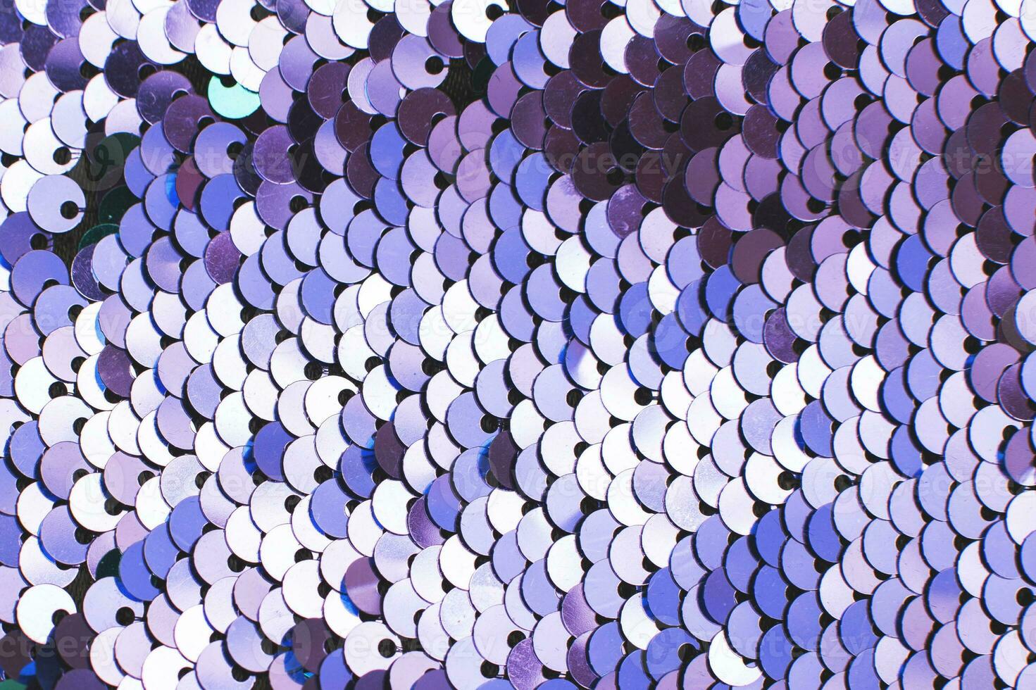 Purple abstract sequins sparkling background. Texture of sequins. photo
