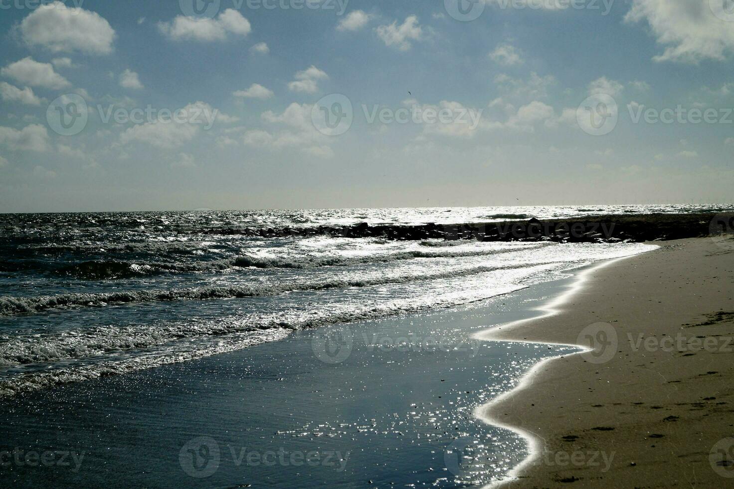 impresiones de el interminable playa a el del Norte mar en blavand Dinamarca foto