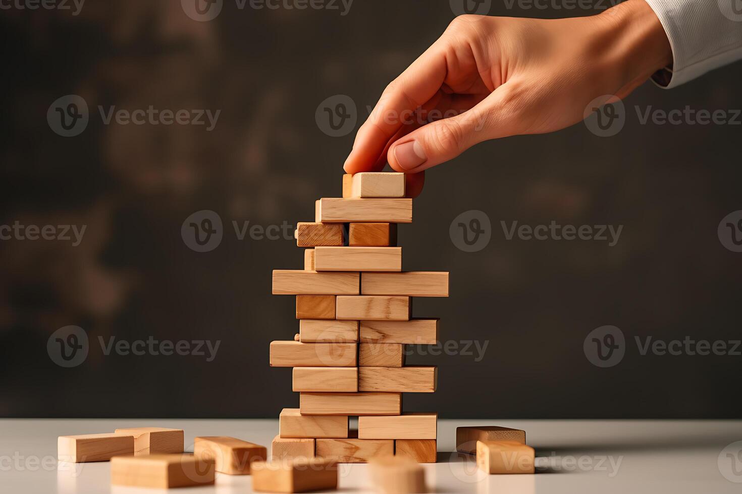 hand putting wood block on to tower, AI Generative photo