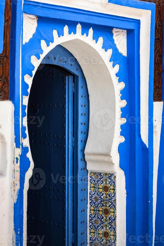 Traditional moroccan door detail in Chefchaouen, Morocco, Africa photo