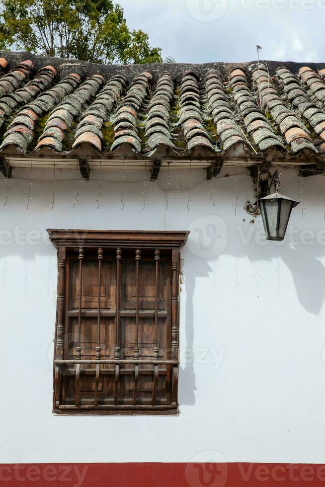 Detail of the beautiful colonial architecture of the streets of the colonial small town of Iza located in the Boyaca department in Colombia photo