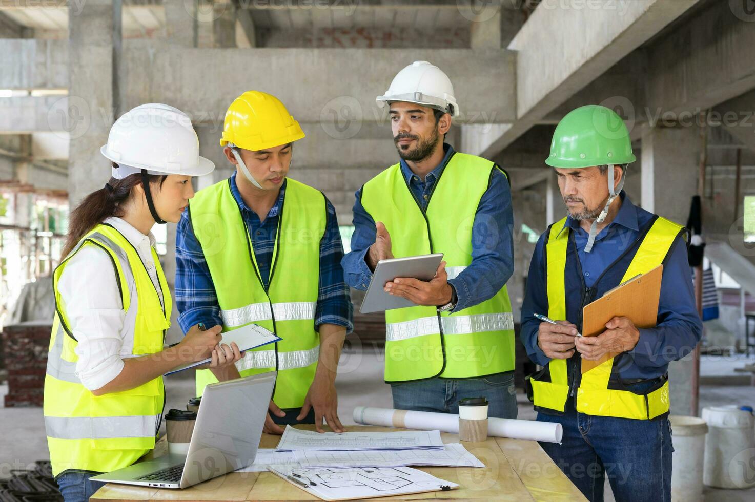 engineering team lead by engineer project manager having a stressful project meeting at the job site over a mistake that is not go according to plan.concept of stress on work,conflict management photo