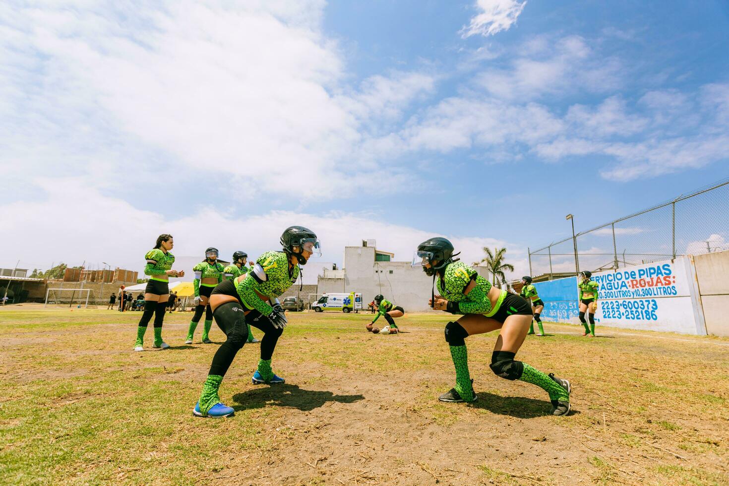 Puebla, Mexico 2023 - Friendly game of women's American football in Mexico on a flat field on a sunny day photo