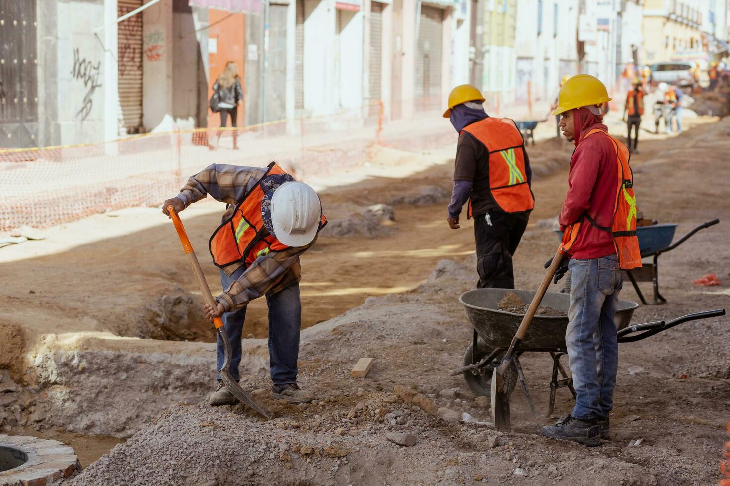 Puebla, Mexico 2023 - Construction workers work to repair a street in the Historic Center of Puebla photo