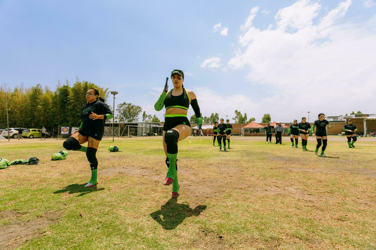 Puebla, Mexico 2023 -  women practice American football on a sunny afternoon photo