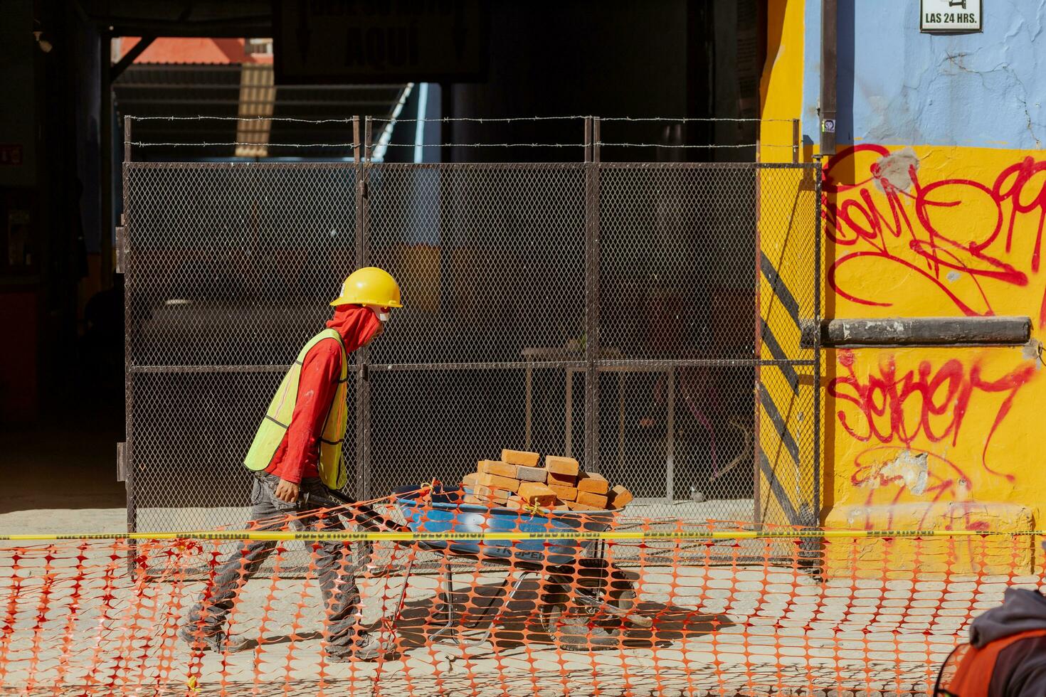 Puebla, Mexico 2023 - Construction workers work to repair a street in the Historic Center of Puebla photo