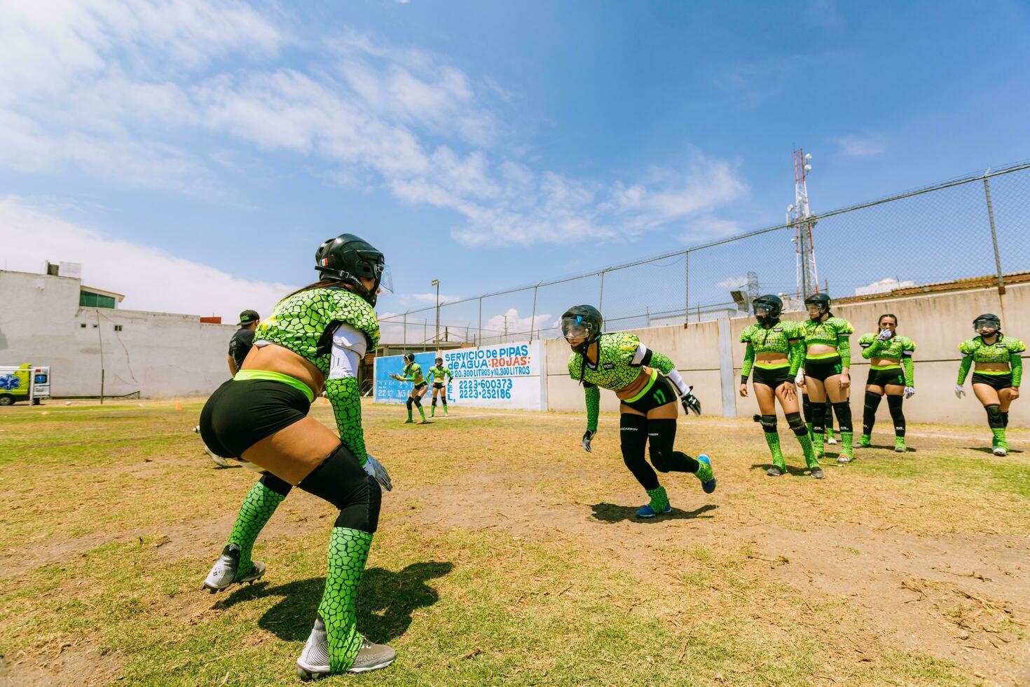 Puebla, Mexico 2023 - Friendly game of women's American football in Mexico on a flat field on a sunny day photo
