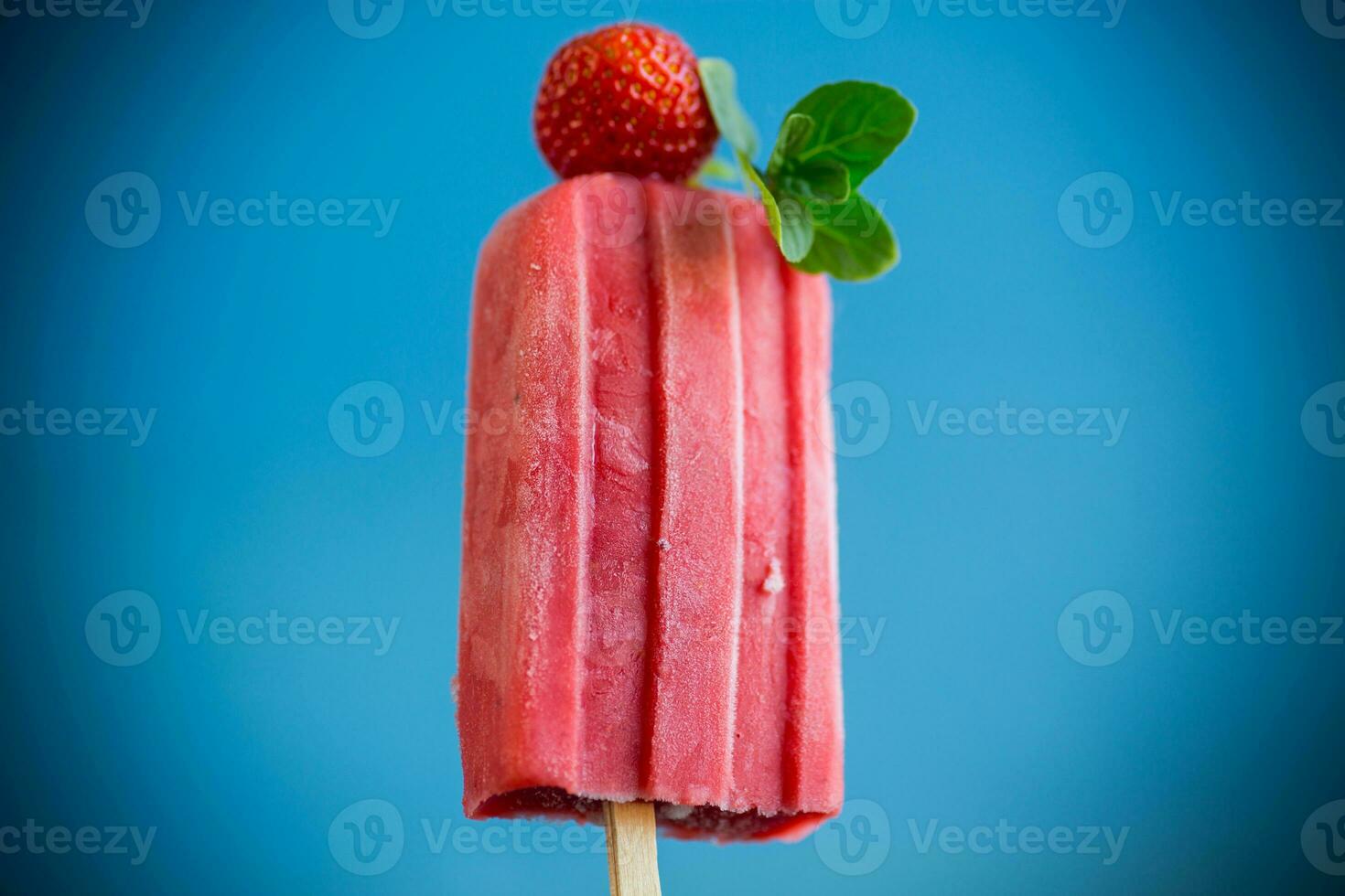 cooked homemade strawberry ice cream on a stick photo