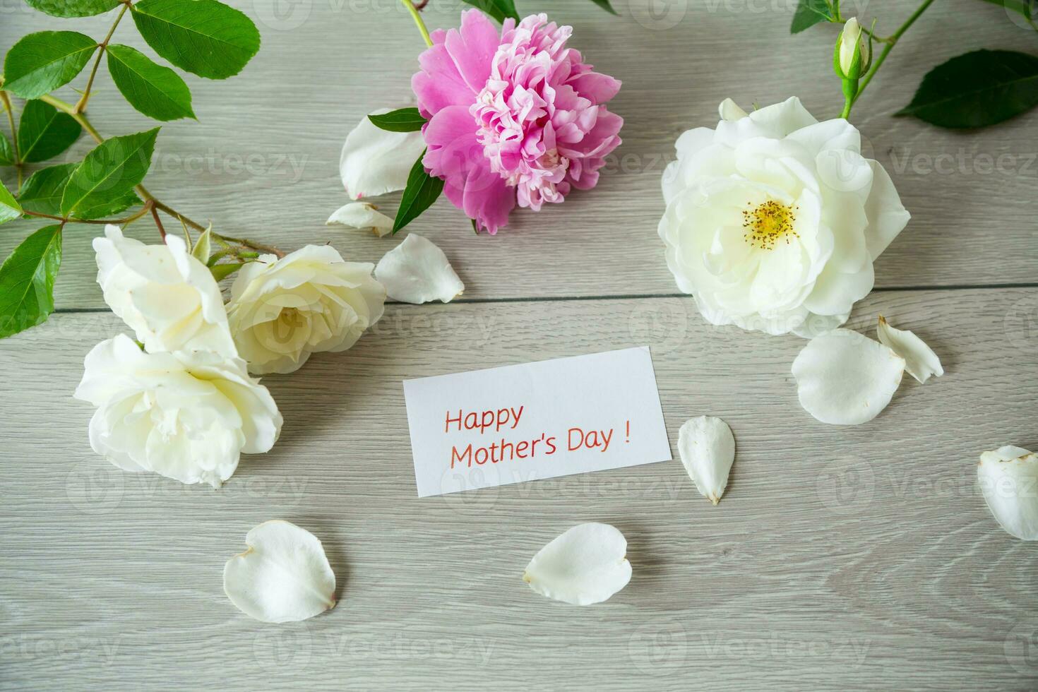 bouquet of summer white roses and peonies on wooden table photo