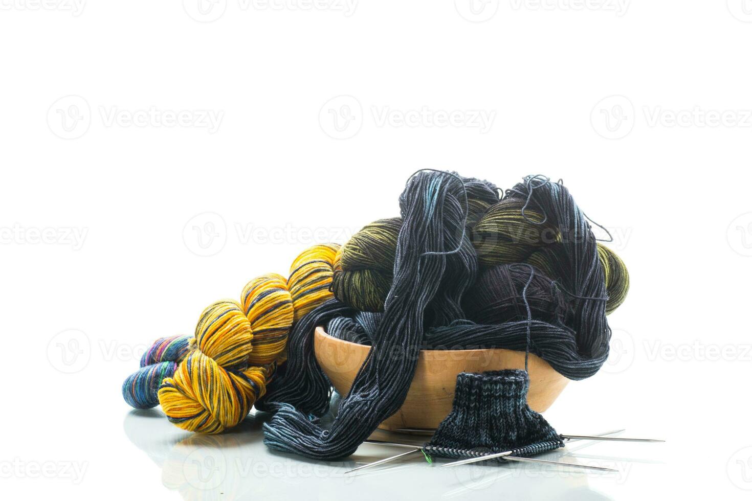 Colored threads, knitting needles and other items for hand knitting photo