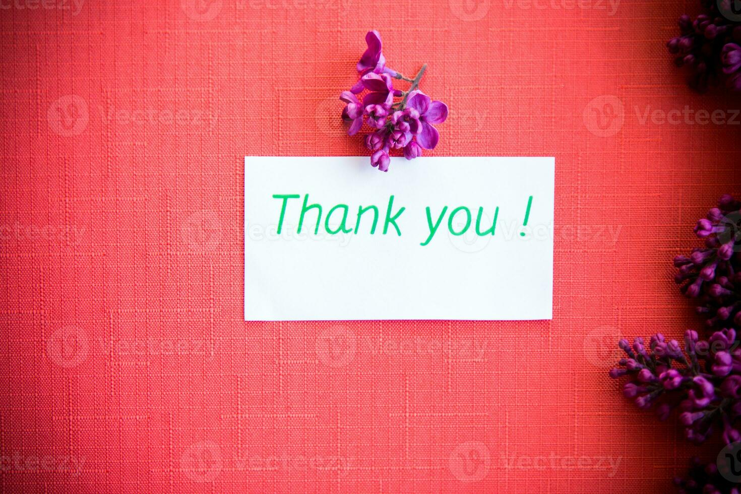 The beautiful lilac on a wooden background photo