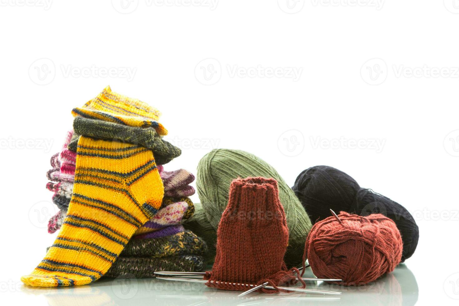 Colored threads, knitting needles and other items for hand knitting photo