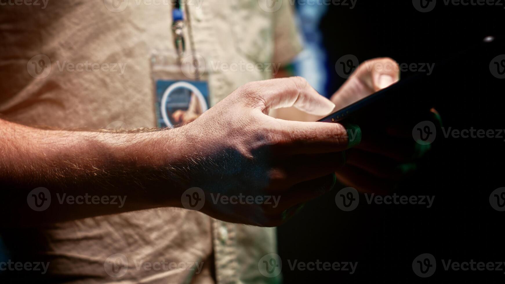 Expert in server room using tablet to work with essential data for training machine learning models that power artificial intelligence systems necessitating storage, processing, close up photo