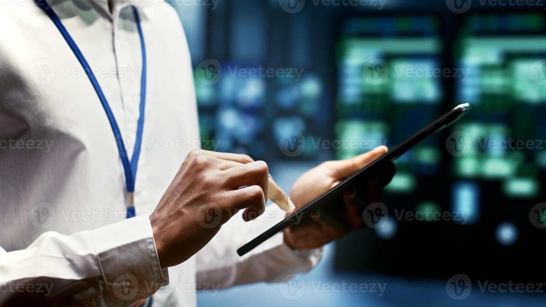 Close up of skillful engineer doing inspection in blockchain technology application specific integrated circuit data center. Experienced technician working in mining facility photo