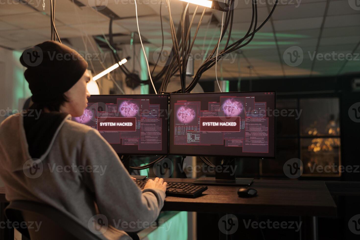 System hacked by cybercriminal reading warning alert, it specialist solving cyberattack problem at night. Working on computer security technology and data breach. Hacker accessing database server. photo