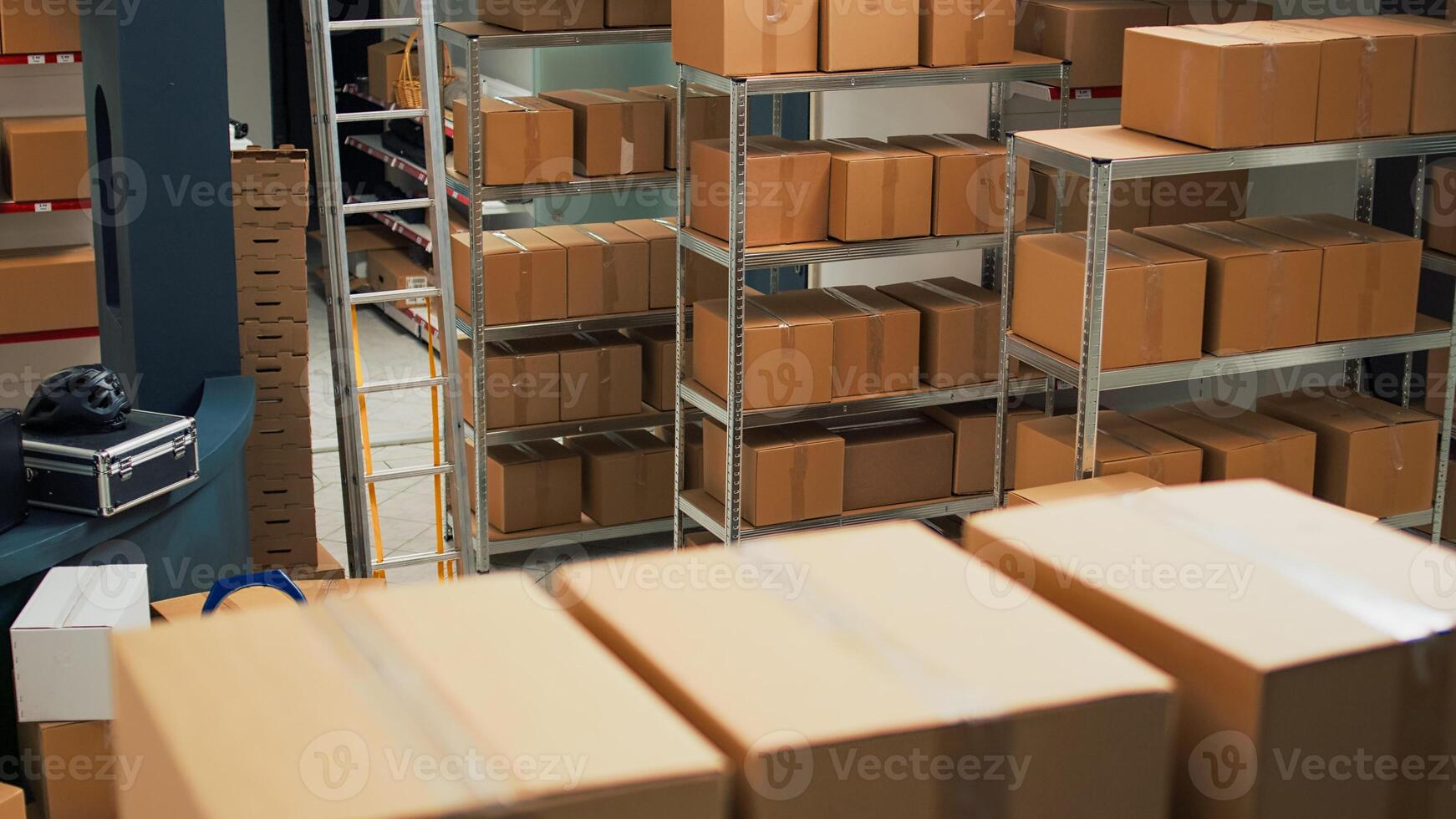 Storage room space filled with carton packages on shelves and racks, empty warehouse used to ship merchandise orders. Storehouse with products, distribution and shipping retail work. photo