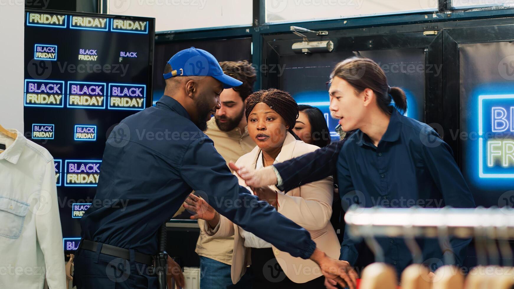 Retail store opening on black friday, letting customers inside shopping center during seasonal sales. Diverse people anxious to start shopping at half price, ready to find best deals. photo