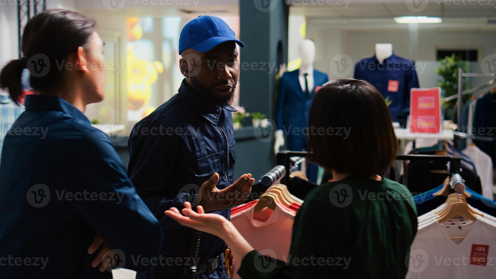 Black friday clients waiting in line, angry diverse people eager to start shopping spree with promotions. Crazy crowd of shoppers arguing with security guard, asking him to open outlet. photo