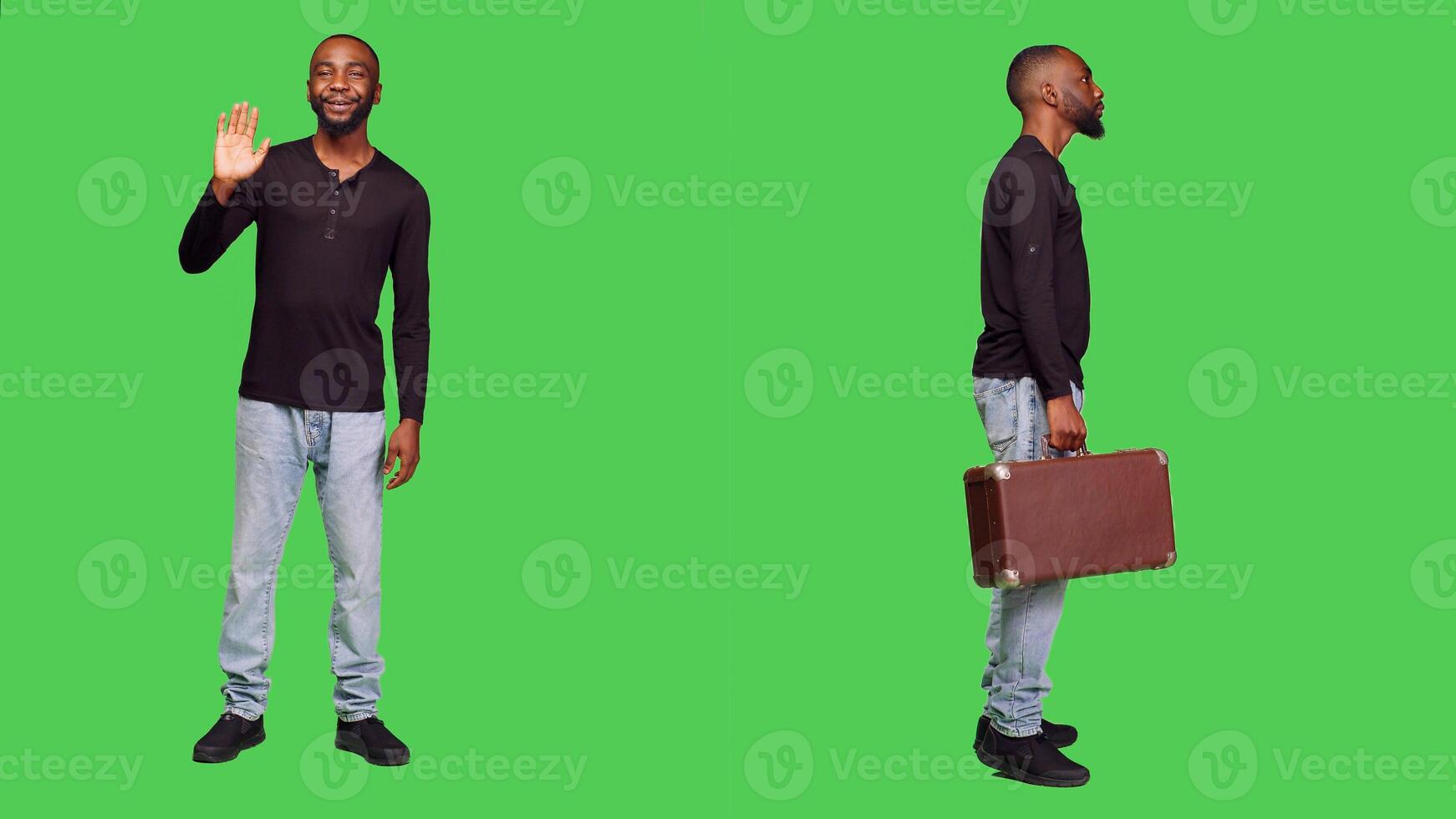 Male model having suitcase luggage in studio and waiting for something, standing over full body greenscreen. Young smiling adult with briefcase carrying bag in studio, cheerful man. photo