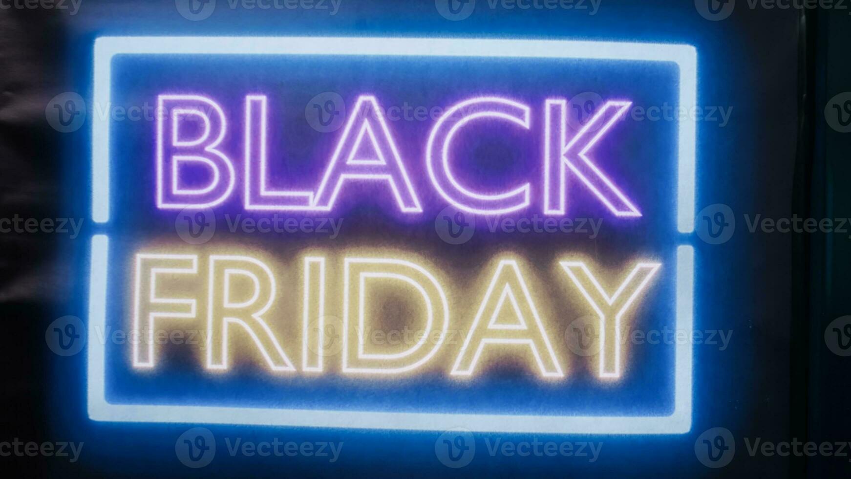Glowing black friday sale signs on entrance front door at mall, local clothing store offering promotions and big discounts during seasonal sale. Clothes shop marketing advertisement. photo