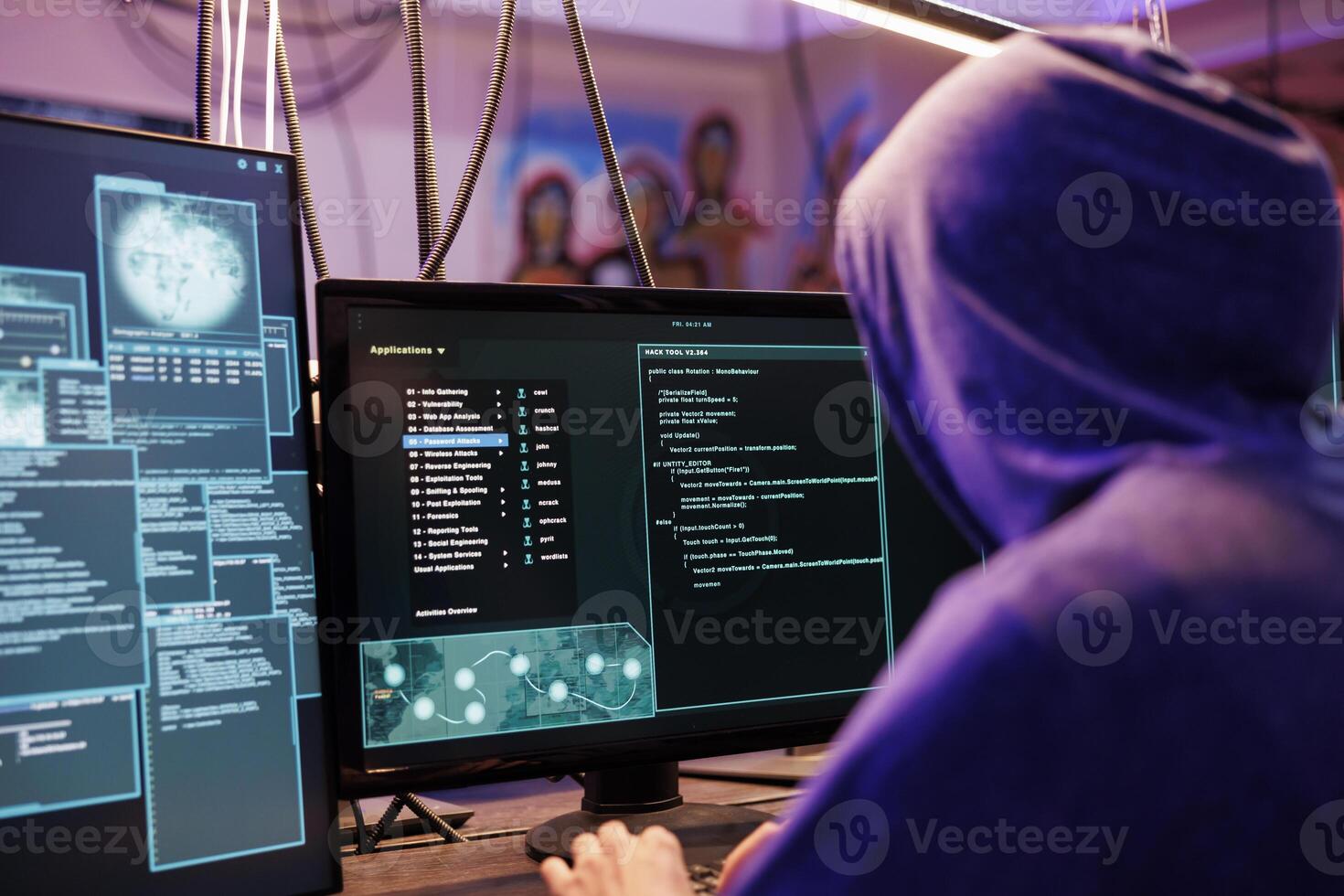 Hacker in hood running illegal malware on computer screen with multiple windows. Criminal launching malicious software and coding ransomware in abandoned warehouse at night photo