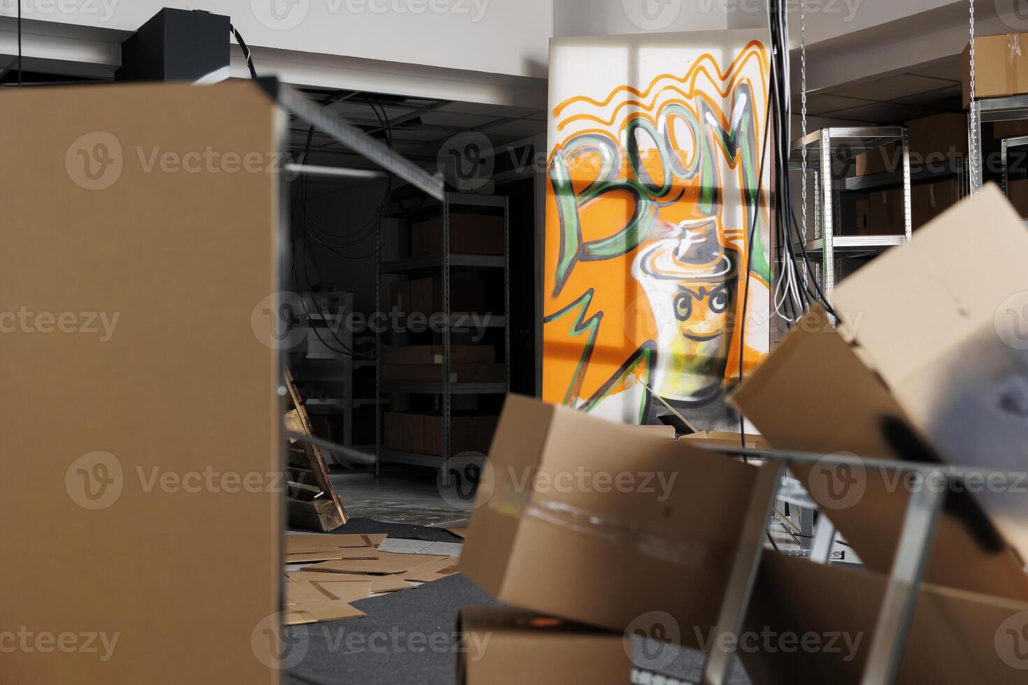 Old decaying structure covered in rusty graffiti artwork with garbage, debris and spray paint. Empty abandoned warehouse looking neglected and catastrophic, crumbling rusty place with dust. photo