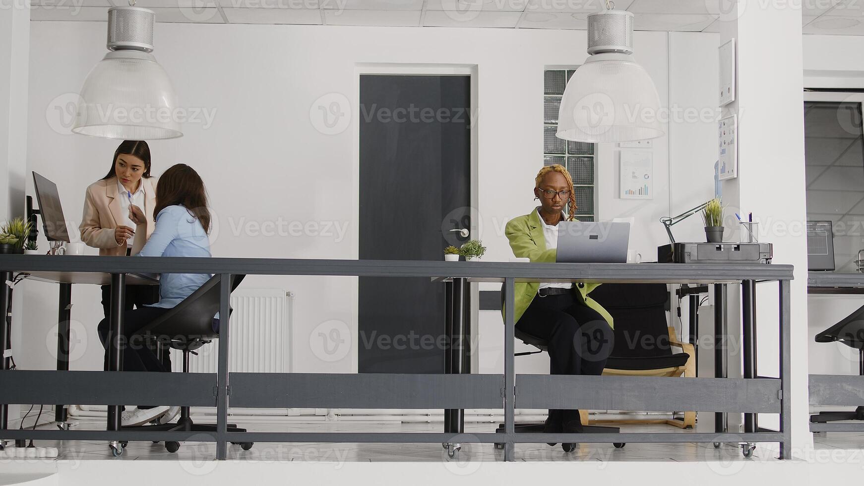Business woman planning development strategy at desk, looking at analytics online on laptop to create annual report. Office worker checking information on statistics, agency management. photo