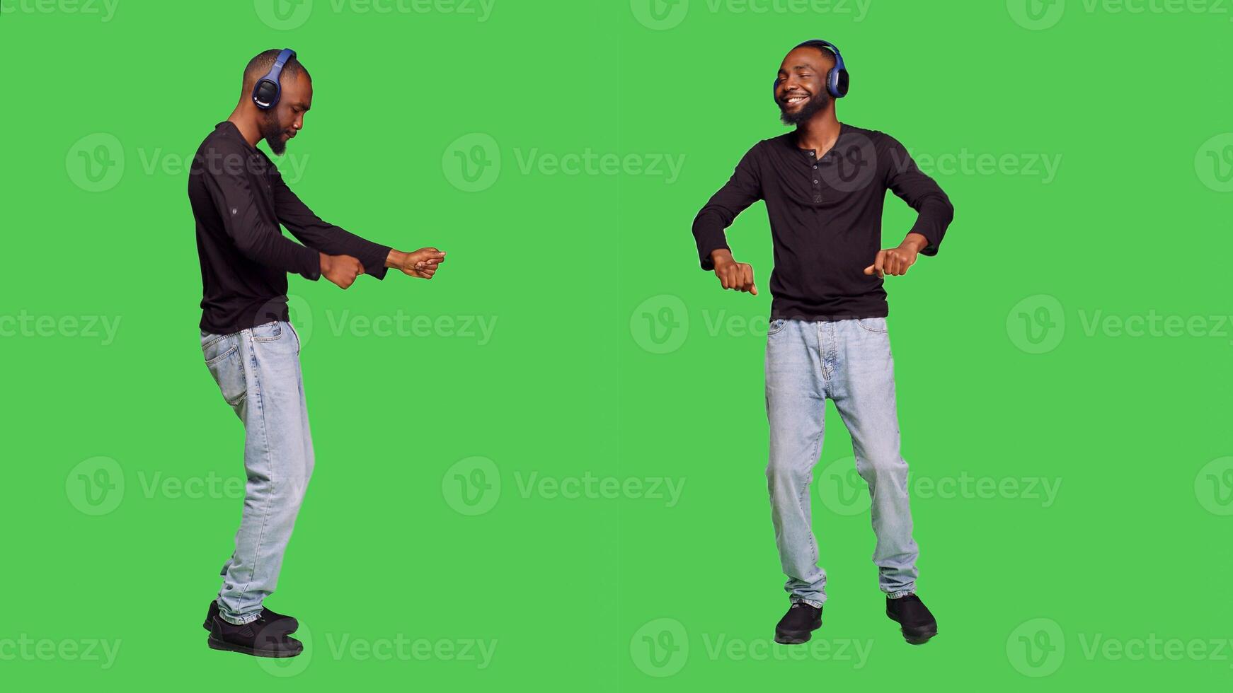 Male model with headphones dancing on camera, listening to music on audio headset and having fun. Young person doing dance moves while he enjoys positive songs, standing over greenscreen. photo