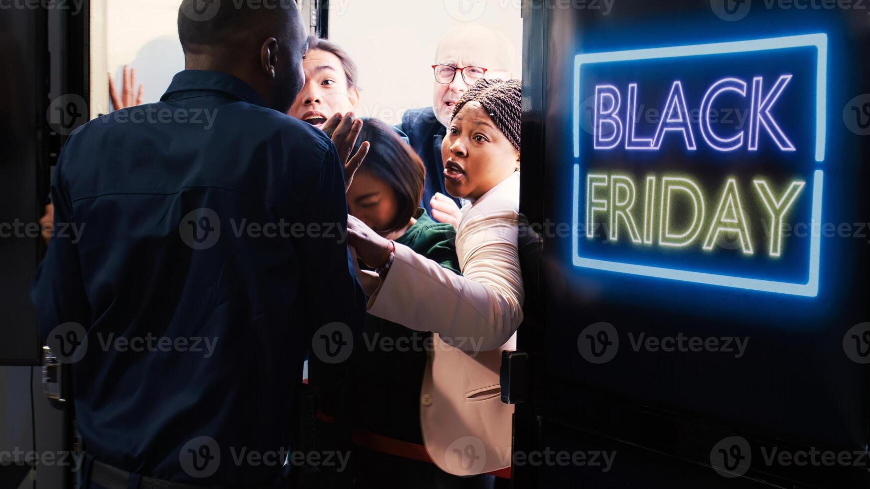 Aggressive people arguing with security at clothing shop front door, waiting in line for black friday promotions. Bargan hunters rushing to enter retail store in search of deals and special offers. photo