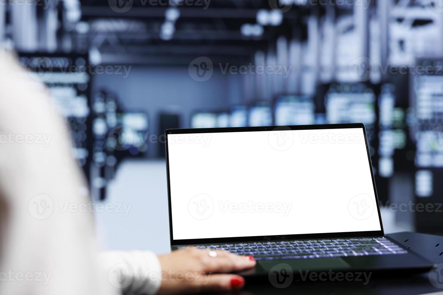 Close up shot of mock up laptop used by specialist in server hub delivering massive computing power, capable of processing and storing large amounts of data and controlling network resources photo