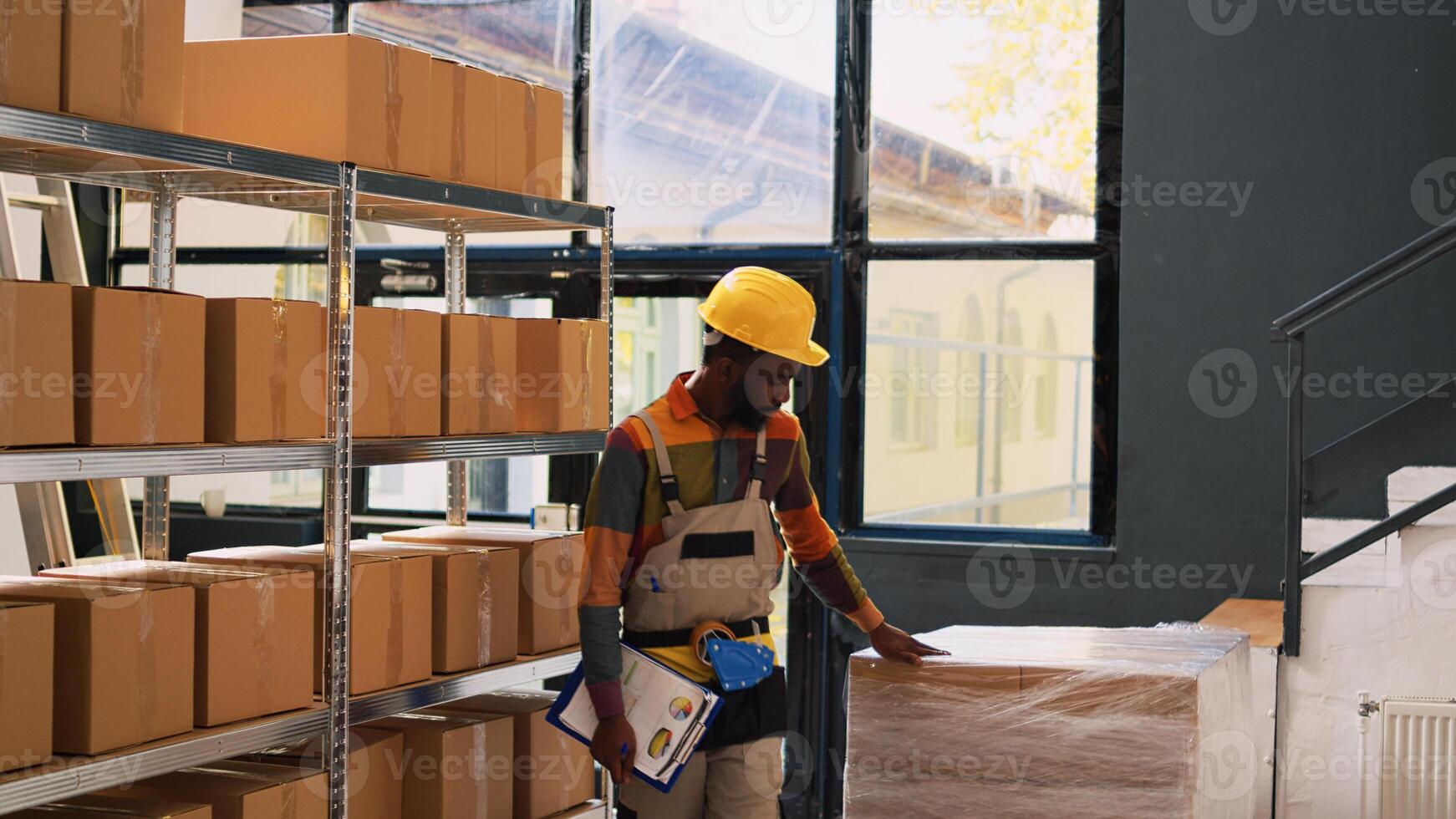 Diverse colleagues verifying goods list on papers, checking delivery system before working on shipment. Man and woman working on merchandise inventory in depot, quality control. photo