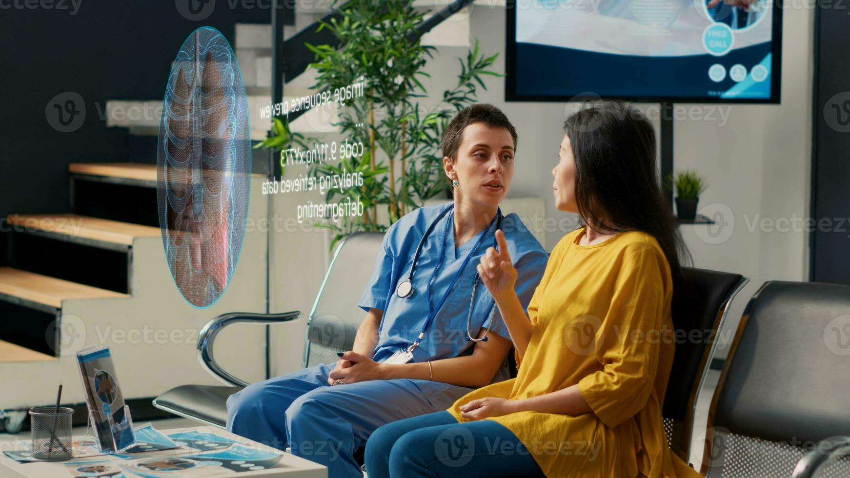 Doctor in modern clinic foyer using holographic projector, showing aged patient lungs close up scan, visualizing pulmonar exam results using AR technology and explaining curative remedies photo