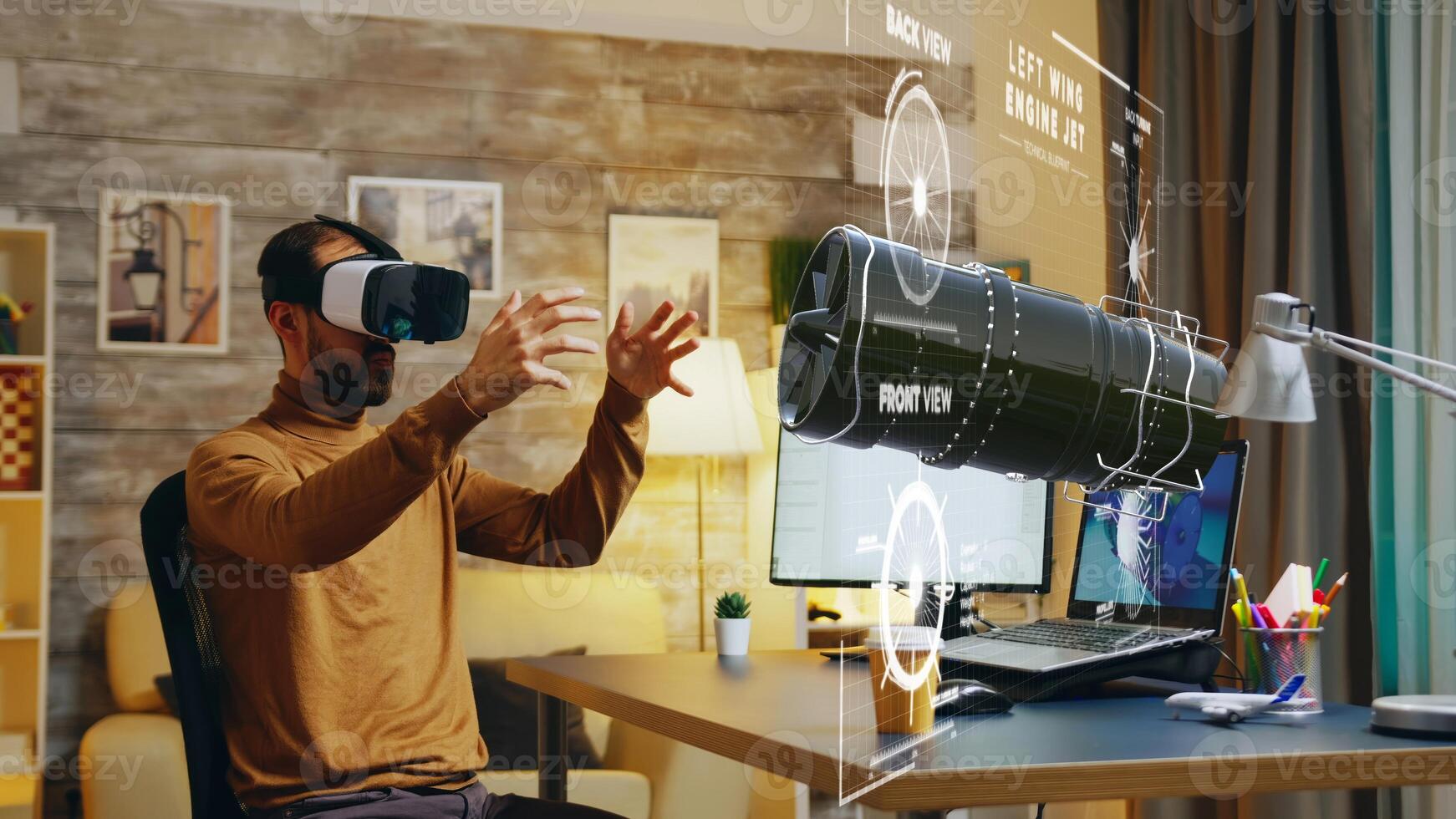 Cad expert manufacturing machine product parts on computer using augmented reality technology, working on industrial machinery production assisted by innovative engineering VR application photo