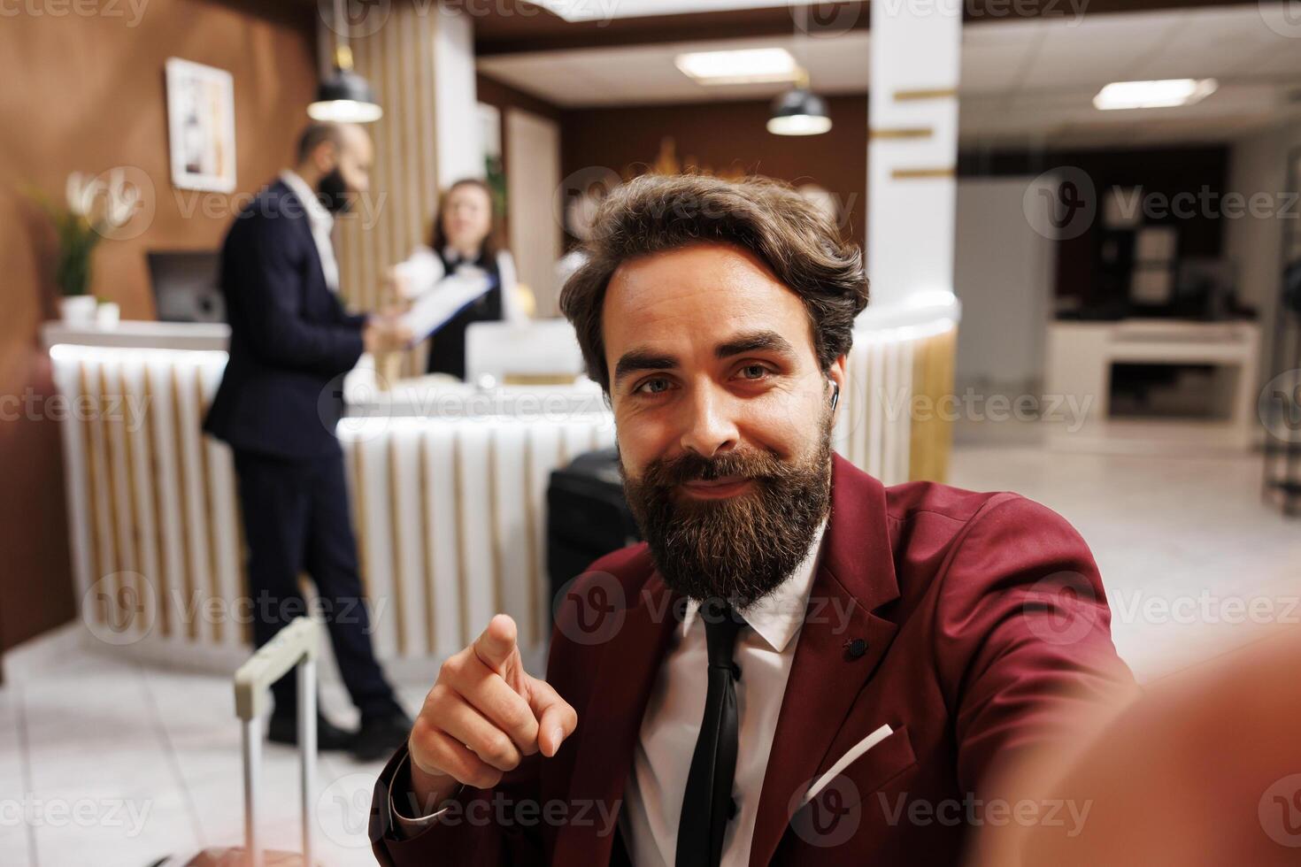 POV of businessman using videocall to discuss new collaboration terms with partners, online telework call. Entrepreneur in formalwear calling manager on remote videoconference at hotel. photo