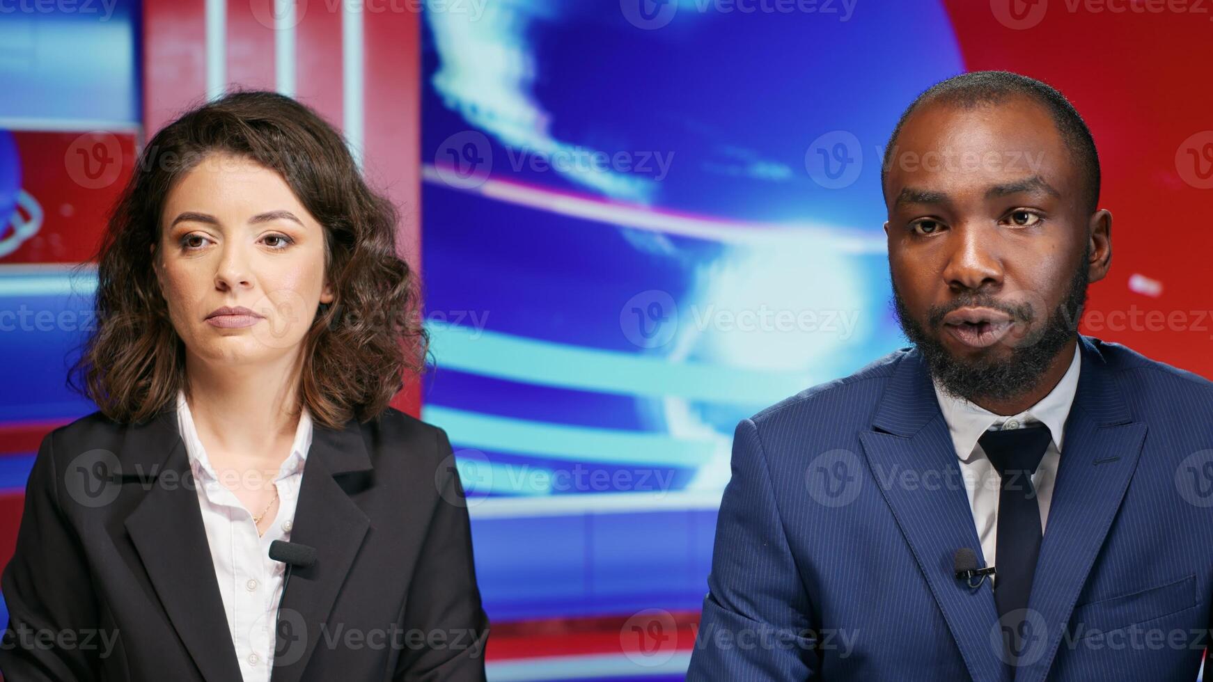 Diverse hosts on morning show live debating daily events topics on television, hosting program and discussing about breaking news. Team of reporters addressing newscast reportage information. photo